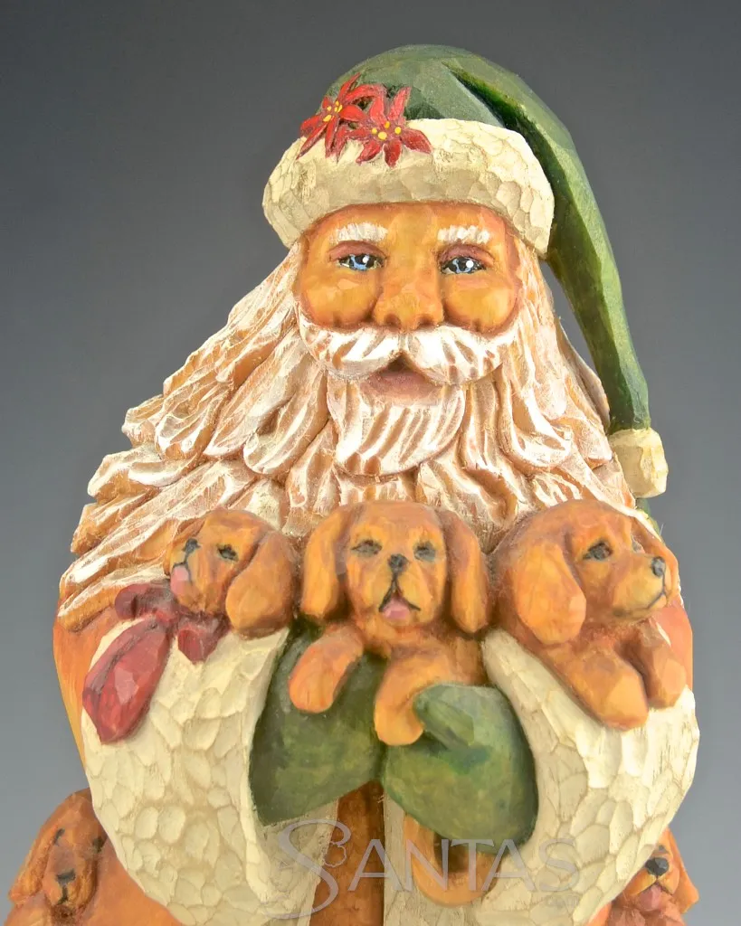 Barbara Scoles Santa Carving with Puppies